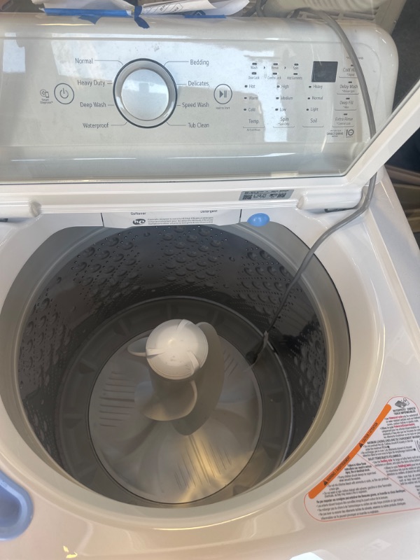 Photo 3 of WT7155CW LG 4.8 cu.ft. Ultra Large Capacity Top Load Washer with 4 Way Agitator - White