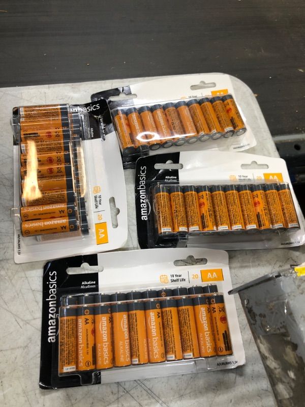 Photo 1 of Amazon Basics AA Alkaline Batteries - Blister Packaging 20 Count IN EACH PACK  (Pack of 4)