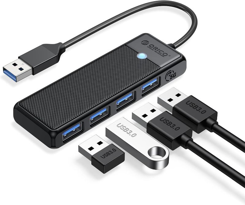 Photo 1 of USB 3.0 Hub, ORICO 4-Port USB Hub, Ultra Slim USB Splitter for Laptop for MacBook, Mac Pro, iMac, Surface Pro,XPS, PS5, PC, Flash Drive, Mobile HDD(Black/0.5ft)
