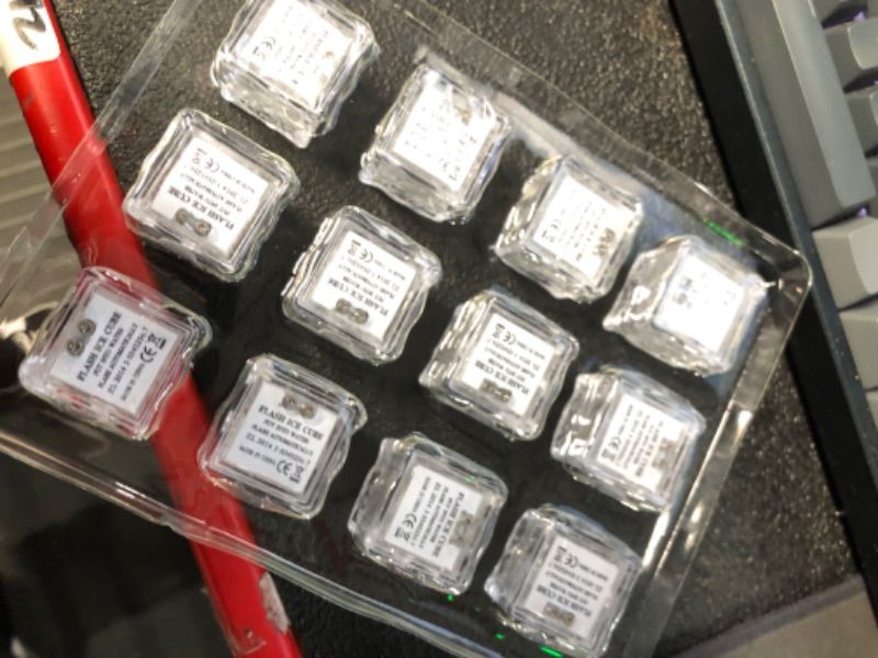 Photo 1 of Light Up Ice Cubes, 12/24/48/96 Pack Multi Color Led Ice Cubes for Drinks with Changing Lights, IP67 Waterproof Reusable Glowing Flashing Ice Cube for Club Bar Party Wedding Decor ICE CUBE-12 PCS