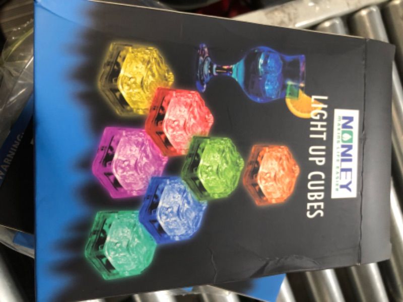 Photo 1 of Light Up Ice Cubes, 12/24/48/96 Pack Multi Color Led Ice Cubes for Drinks with Changing Lights, IP67 Waterproof Reusable Glowing Flashing Ice Cube for Club Bar Party Wedding Decor ICE CUBE-12 PCS