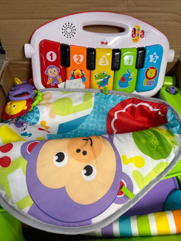 Photo 2 of Fisher-Price Baby Gym Newborn Playmat with Kick & Play Piano Musical Toy, MULTI