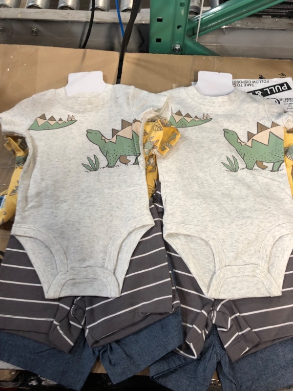 Photo 1 of 6-9 months and 9-12 months Carters clothing 2 pairs total 4 outfits
