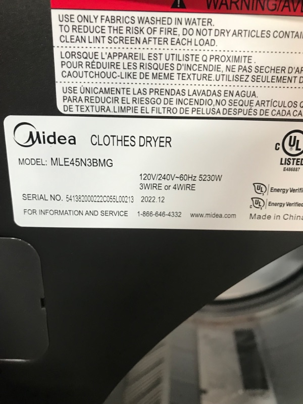 Photo 1 of **HAS DAMAGE TO SIDES, UNABLE TO TEST, NO POWER CORD INCLUDED** MIDEA 7.5 Cu.Ft. Top Load Matching Dryer