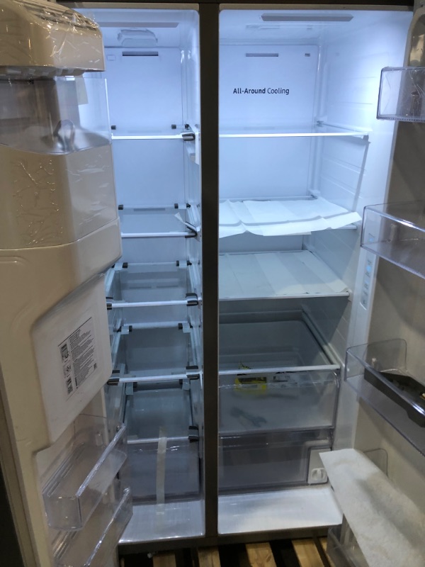 Photo 6 of **PLATE OFF ON TOP OF FRIDGE***Samsung 27.4-cu ft Side-by-Side Refrigerator with Ice Maker (Fingerprint Resistant Stainless Steel)