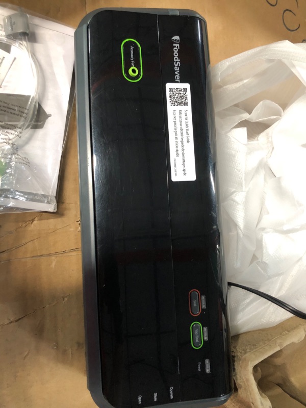 Photo 1 of **SEE NOTES/FOR PARTS**
Foodsaver FM2000 Vacuum Sealer System with Starter Bags & Rolls, Black