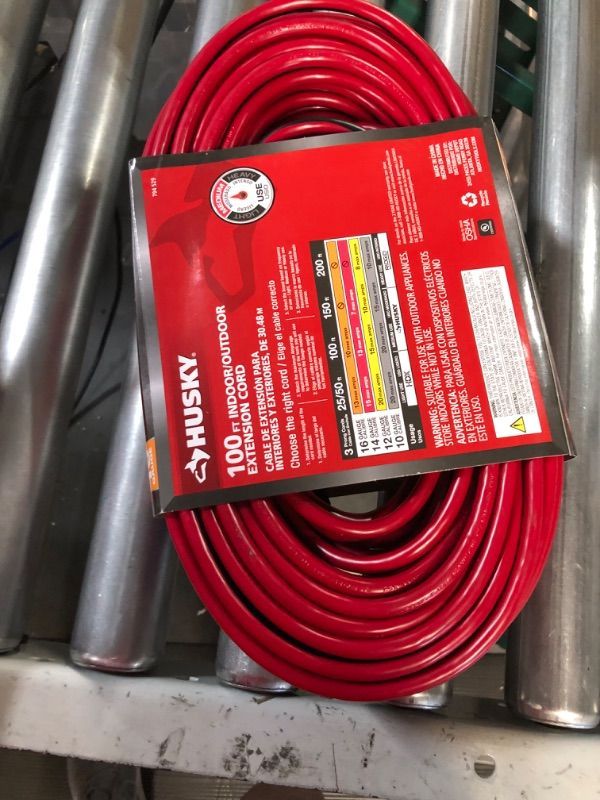 Photo 4 of Husky 100 ft. Red and Black 16/3 Medium-Duty Indoor/Outdoor Extension Cord