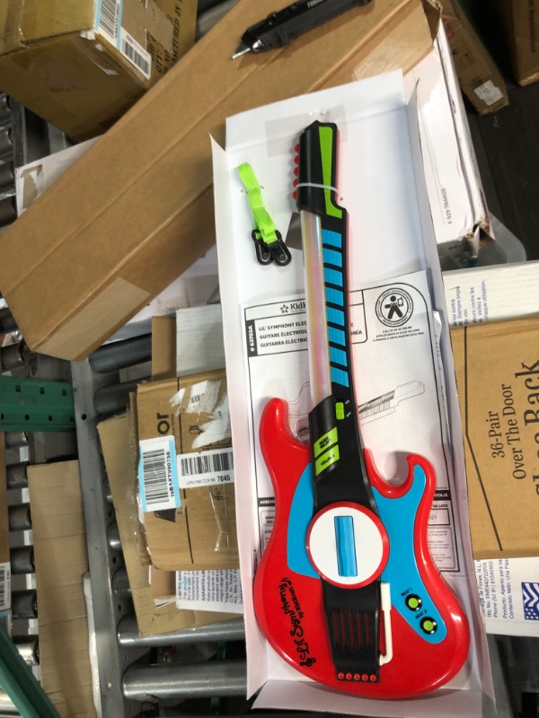 Photo 4 of KidKraft Lil' Symphony Electric Guitar Toy with Lights, Sounds and Adjustable Strap, Gift for Ages 3+, Amazon Exclusive