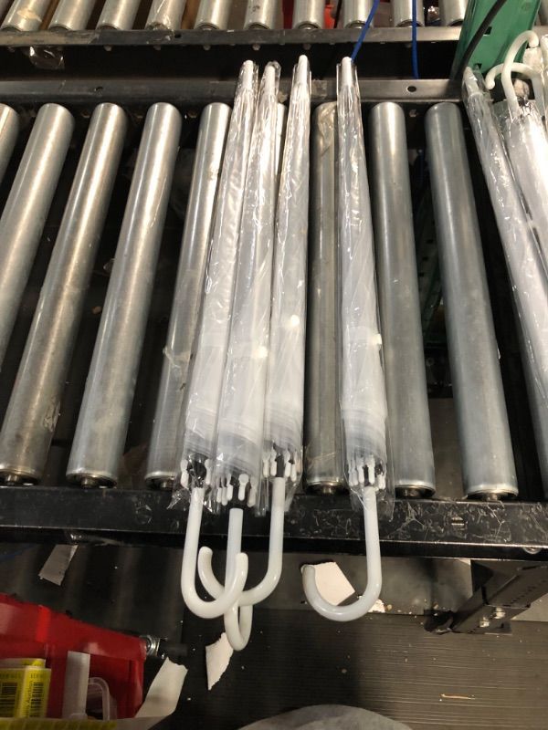 Photo 1 of *NON REFUNDABLE* 4 clear umbrellas with white handles