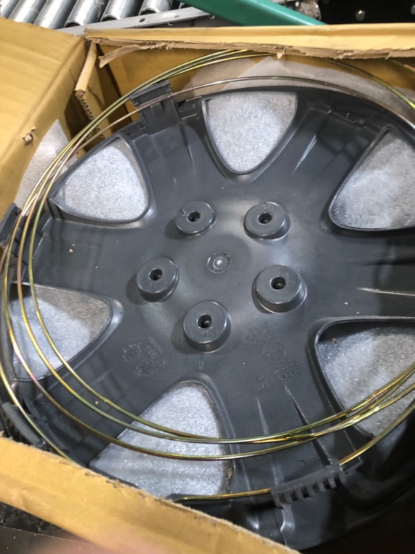 Photo 1 of **PARTS** **DAMAGE** Four ABS Plastic Silver Colored Hubcaps - 15 Inch Diameter