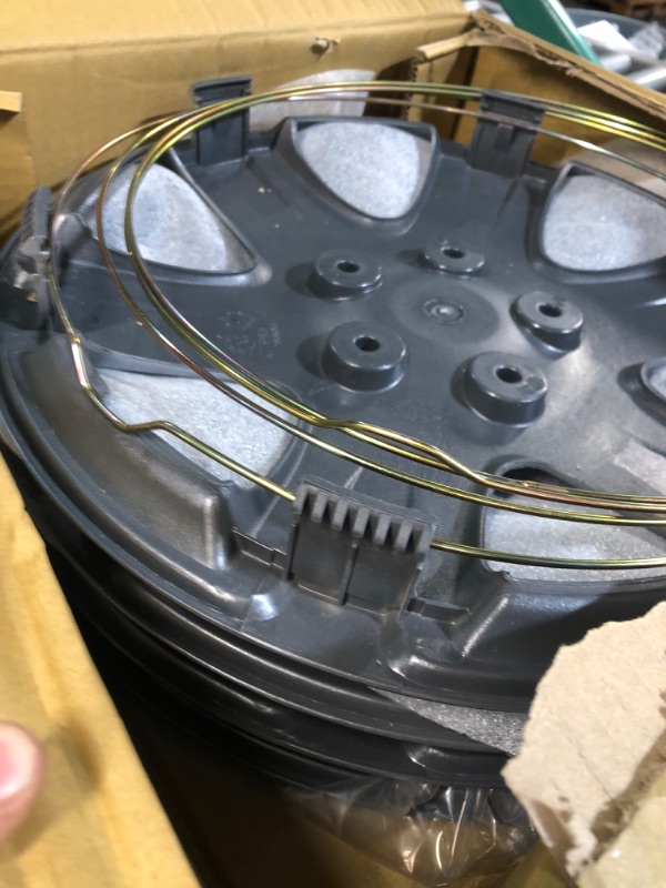 Photo 1 of **PARTS** **DAMAGE** Four ABS Plastic Silver Colored Hubcaps - 15 Inch Diameter