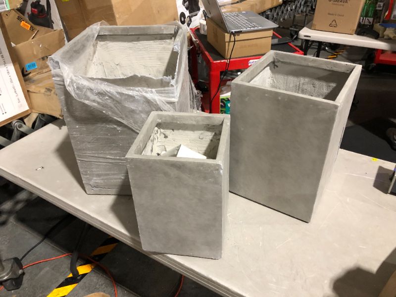 Photo 2 of ***ALL PLANTERS ARE DAMAGED - SEE PICTURES - FOR PARTS - NONFUNCTONAL***
Kante 19", 16" and 13" H Concrete Tall Square Planters