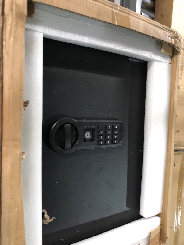 Photo 4 of ***LOCKED - KEYS MISSING - NOT FUNCTIONAL - FOR PARTS***
Amazon Basics Steel Home Security Safe with Programmable Keypad - 13.8 x 13 x 19.7 Inches