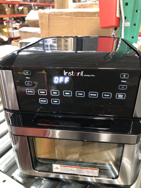 Photo 6 of ***REAR PART IS CRACKED OFF - SEE PICTURES - POWERS ON - UNABLE TO TEST FURTHER***
Instant Vortex Pro Air Fryer, 10 Quart, 9-in-1 Rotisserie and Convection Oven