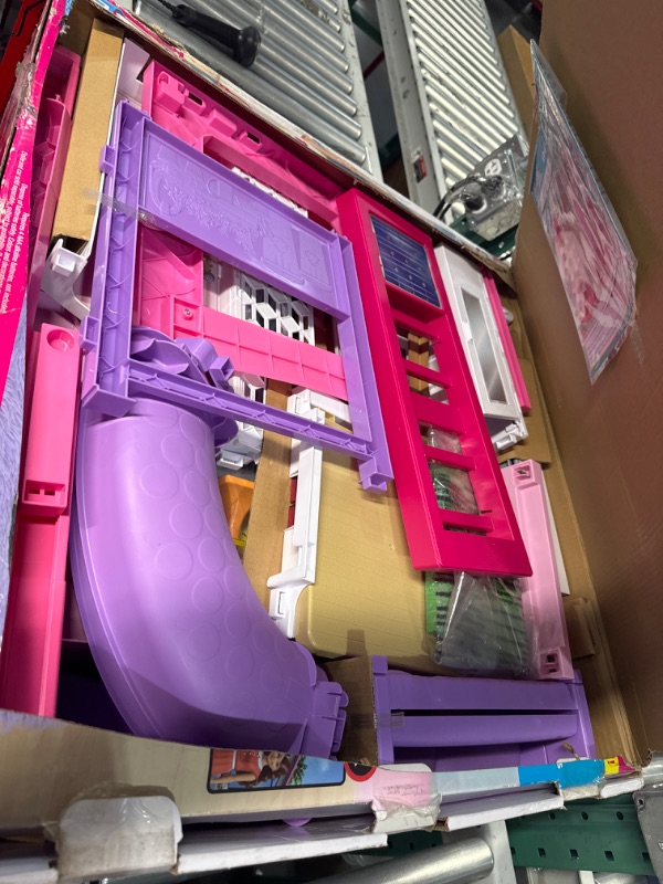 Photo 1 of Barbie Dreamhouse, Doll House Playset with 70+ Accessories