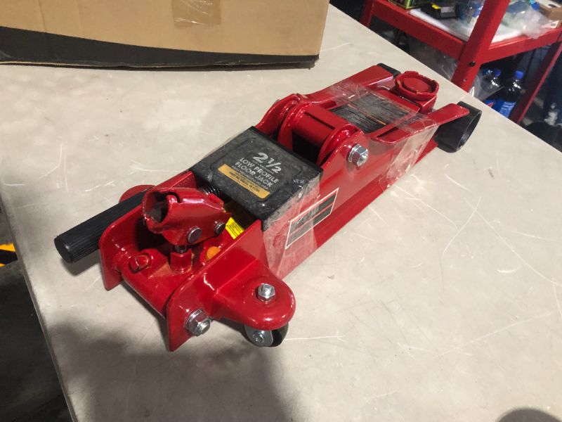 Photo 2 of ***USED - DIRTY - NO PACKAGING - SEE PICTURES***
TCE TCET825051R Torin Low Profile Hydraulic Trolly Jack, 2.5 Ton (5,000 lb) Capacity, Red Red Floor Jack