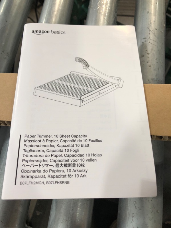 Photo 2 of AmazonBasics Paper Trimmer -12" Blade, 10 Sheet Capacity 12" Paper Trimmer