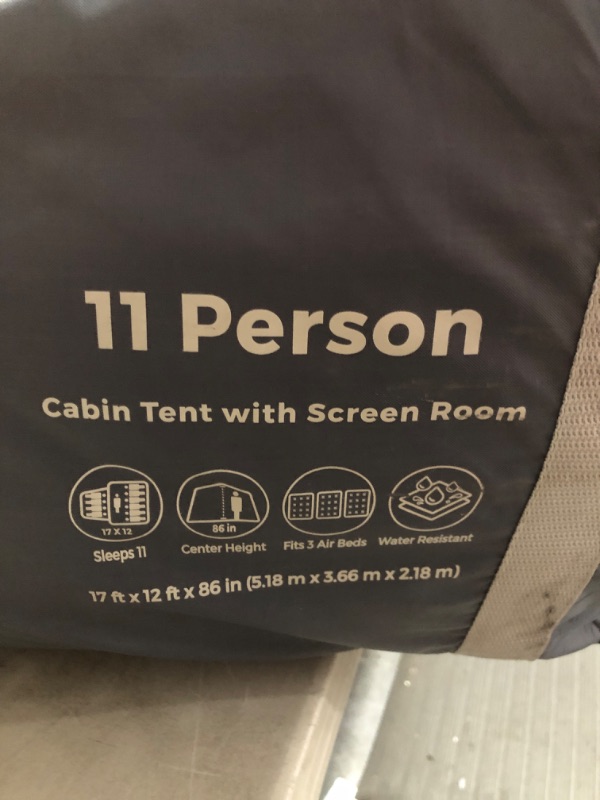 Photo 3 of * item used and dirty * rip at the front of tent * needs repair * 
CORE 11 Person Family Cabin Tent with Screen Room with Included Footprint and Tent Kit