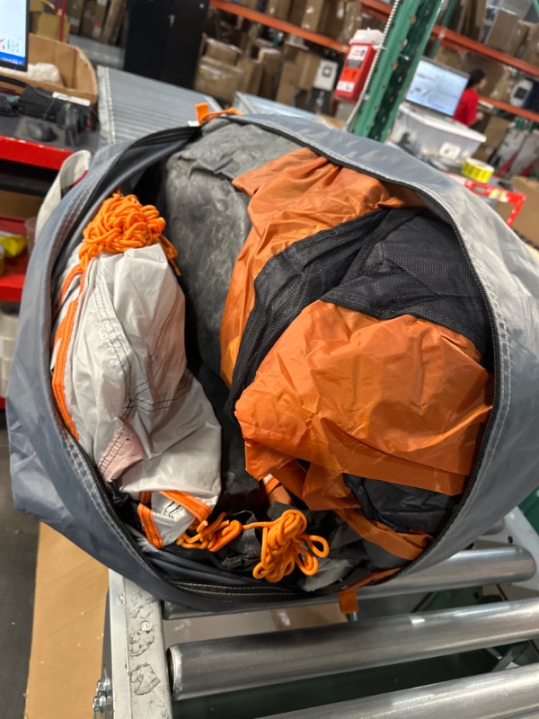 Photo 1 of * item used and dirty * rip at the front of tent * needs repair * 
CORE 11 Person Family Cabin Tent with Screen Room with Included Footprint and Tent Kit