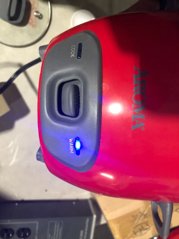 Photo 1 of ***DENTED - SEE PICTURES - POWERS ON - UNABLE TO TEST FURTHER***
Aroma Housewares ARC-743-1NGR 6-Cup (Cooked) (3-Cup UNCOOKED) Pot Style Rice Cooker and Food Steamer,Red