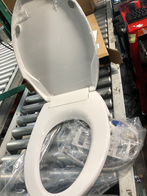 Photo 3 of **SEE  NOTES**
Amazon Basics Nonelectrical Bidet Toilet Seat with Self-cleaning, Elongated, Slow Close, 19.5" x 14.4" x 3.4" White Toilet Seat