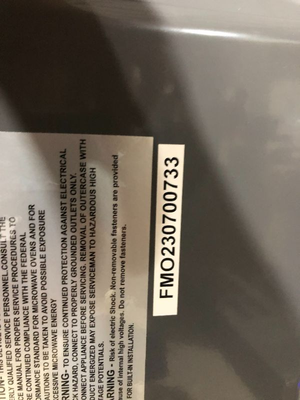 Photo 7 of ***NONFUNCTIONAL - SEE NOTES***
Farberware Classic FMO11AHTBKN 1.1 Cu. Ft. 1000-Watt Microwave Oven with LED Lighting, Metallic Red