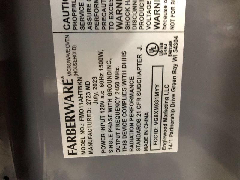 Photo 1 of ***NONFUNCTIONAL - SEE NOTES***
Farberware Classic FMO11AHTBKN 1.1 Cu. Ft. 1000-Watt Microwave Oven with LED Lighting, Metallic Red