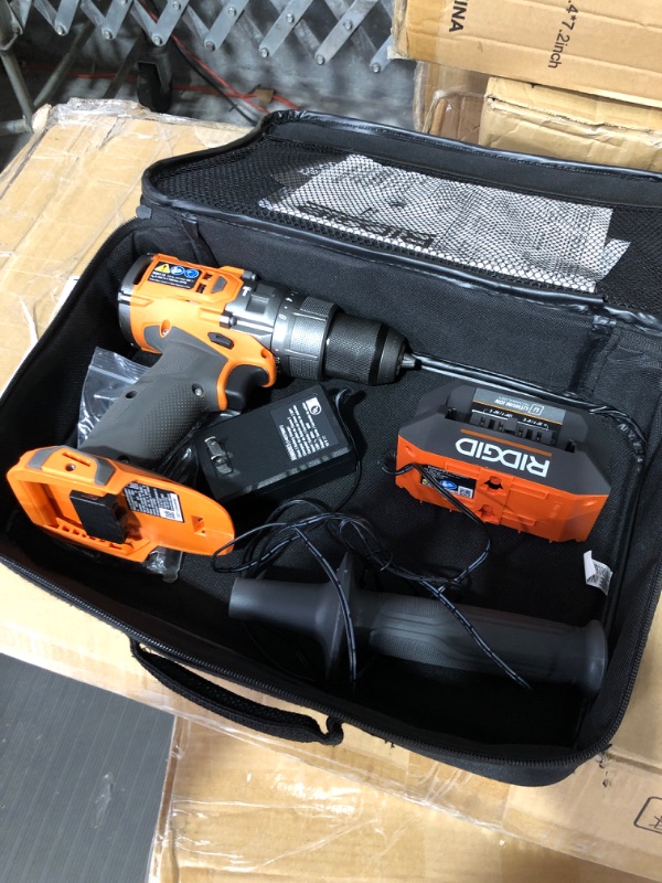 Photo 2 of * used item * missing battery 
RIDGID 18V Brushless Cordless 1/2 in. Hammer Drill/Driver Kit with 4.0 Ah MAX Output Battery, 18V Charger, and Tool Bag