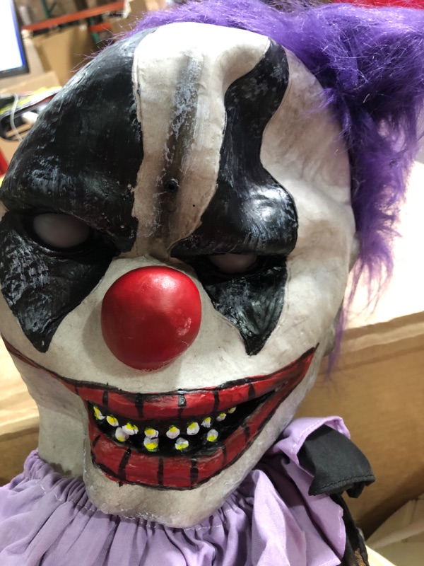 Photo 3 of **SEE NOTES/FOR PARTS**
Haunted Hill Farm Motion-Activated Thrashing Clown with a Meat Cleaver by Tekky, Sitting Scare Prop Animatronic for Indoor or Covered Outdoor Creepy Halloween Decoration, Plug-in or Battery Operated 47" Sitting Thrashing Clown