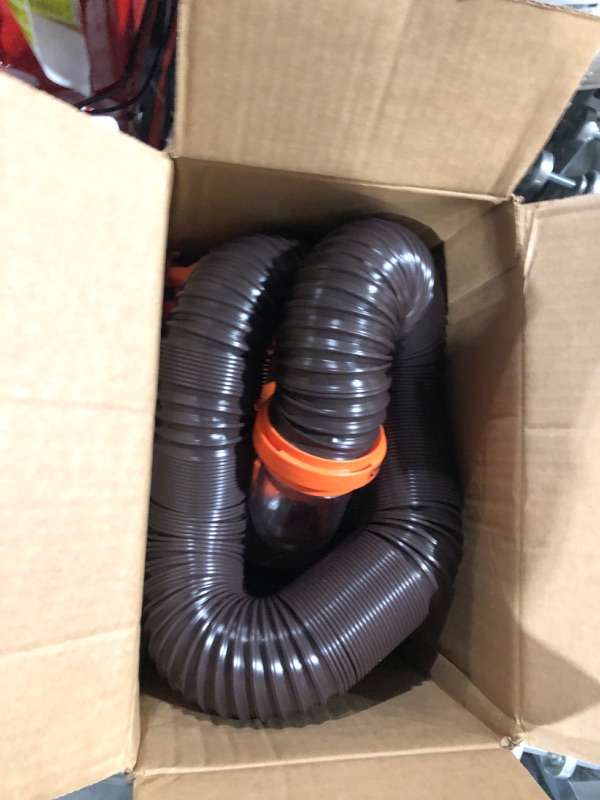 Photo 1 of Camco RhinoFLEX RV Sewer Hose Kit with Swivel Transparent Elbow and 4-in-1 Dump Station Fitting, Brown, 15 Feet (39770) 15ft Sewer Hose Kit Frustration-Free Packaging