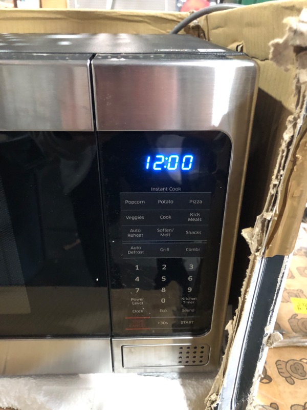 Photo 3 of *READ NOTES BELOW*
1.1 Cu. Ft. Countertop Microwave with Grilling Element