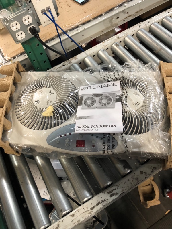 Photo 2 of **PARTS ONLY** Bionaire Window Fan with Twin 8.5-Inch Reversible Airflow Blades and Remote Control