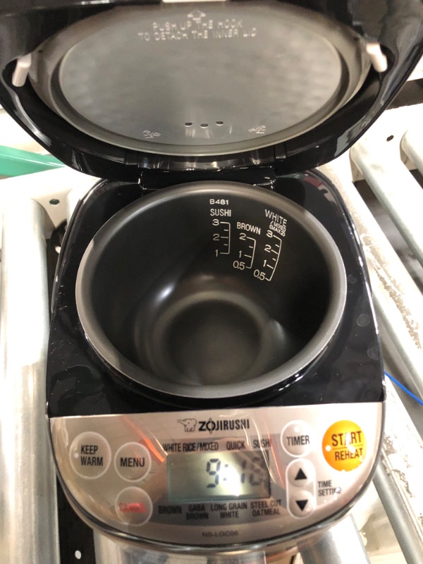 Photo 2 of * used * functional * 
Zojirushi NS-LGC05XB Micom Rice Cooker & Warmer, 3-Cups (uncooked), Stainless Black