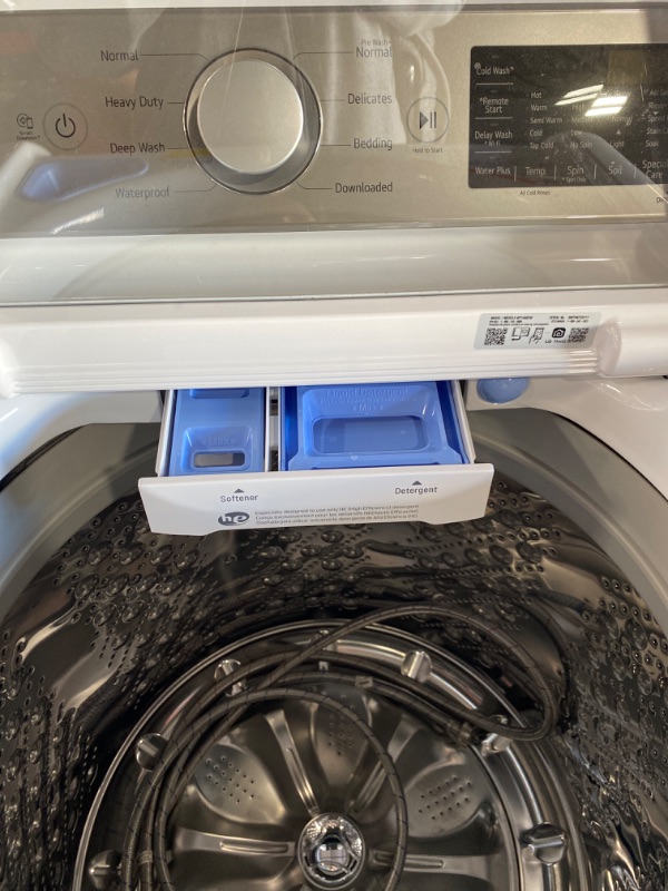 Photo 8 of **USED** **Powers On** 5.5 cu.ft. Mega Capacity Smart wi-fi Enabled Top Load Washer with TurboWash3D™ Technology
