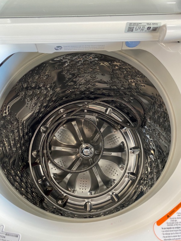 Photo 7 of **USED** **Powers On** 5.5 cu.ft. Mega Capacity Smart wi-fi Enabled Top Load Washer with TurboWash3D™ Technology
