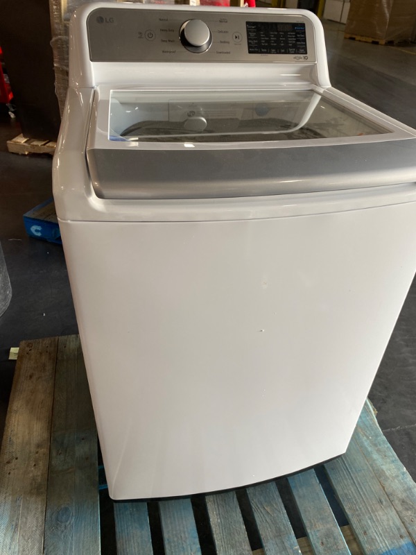 Photo 5 of **USED** **Powers On** 5.5 cu.ft. Mega Capacity Smart wi-fi Enabled Top Load Washer with TurboWash3D™ Technology
