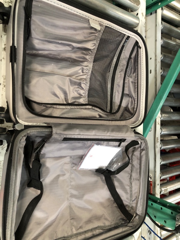 Photo 1 of *MINOR DAMAGE SEE NOTES*
DELSEY Paris Titanium Intl 20.5'' Expandable Spinner Suitcase - Silver