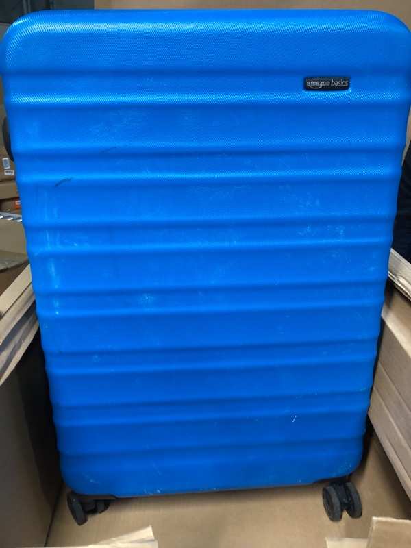 Photo 4 of ***USED & DIRTY*** Amazon Basics 30-Inch Hardside Spinner, Blue Blue 30-inch Spinner