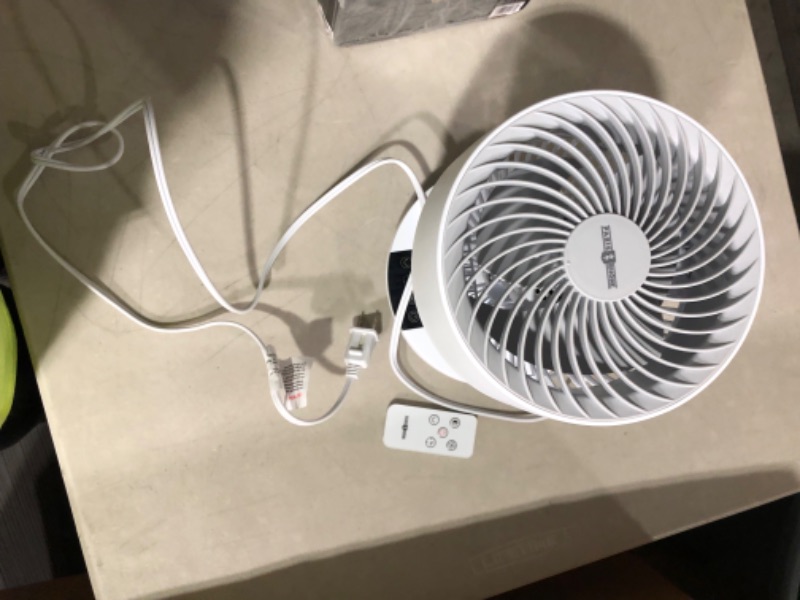 Photo 2 of **POWERS ON** PARIS RHÔNE Air Circulator Fan with Remote