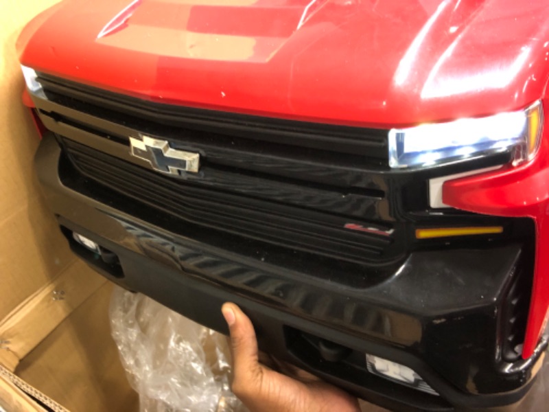 Photo 4 of 12V Chevy Silverado Ride On Truck with HIGH Speed Mode (5 MPH) & Parent Remote Control, Kid's Battery Powered Licensed Electric Vehicle, LED Lights, Real Tailgate, & Truck Sounds, by ReadyGO - Red