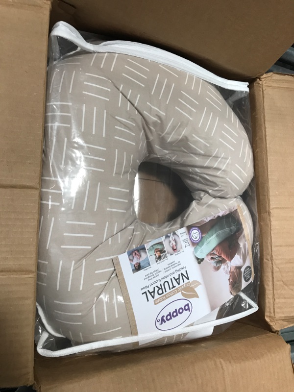 Photo 2 of Boppy Nursing Pillow Organic Original Support, Sand Criss Cross, Ergonomic Nursing Essentials for Bottle and Breastfeeding, Firm Hypoallergenic Fiber Fill with 100% Organic Cotton Nursing Pillow Cover