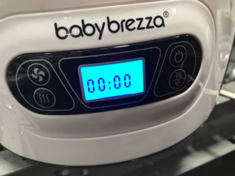 Photo 4 of Baby Brezza Baby Bottle Sterilizer and Dryer Machine – Electric Steam Sterilization - Universal Fit - Pacifiers, Glass, Plastic, and Newborn Feeding Bottles