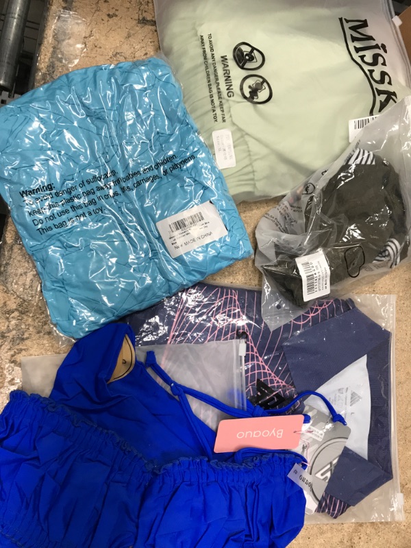 Photo 1 of 5 Piece Assorted Clothing Bundle 
