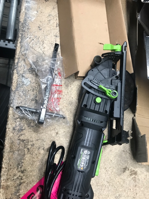 Photo 2 of Genesis GCS445SE 4.0 Amp 4-1/2" Compact Circular Saw with 24T Carbide-Tipped Blade, Rip Guide, Vacuum Adapter, and Blade Wrench & GACSB452 4 1/2" 60-Teeth High Speed Steel Circular Saw Blade Saw + Saw Blade