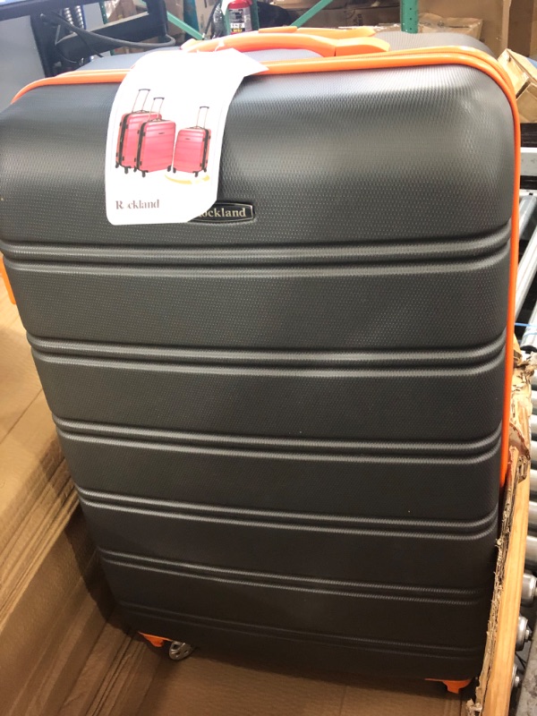 Photo 2 of "MISSING SMALLEST SUIT CASE, 2 ONLY" Rockland Melbourne Hardside Expandable Spinner Wheel Luggage, Charcoal, 3-Piece Set (20/24/28) 3-Piece Set (20/24/28) Charcoal