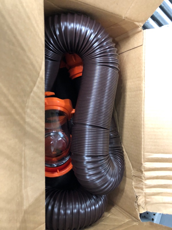 Photo 1 of Camco 20' (39742) RhinoFLEX 20-Foot RV Sewer Hose Kit, Swivel Transparent Elbow with 4-in-1 Dump Station Fitting-Storage Caps Included , Black , Brown 20ft Sewer Hose Kit Frustration-Free Packaging