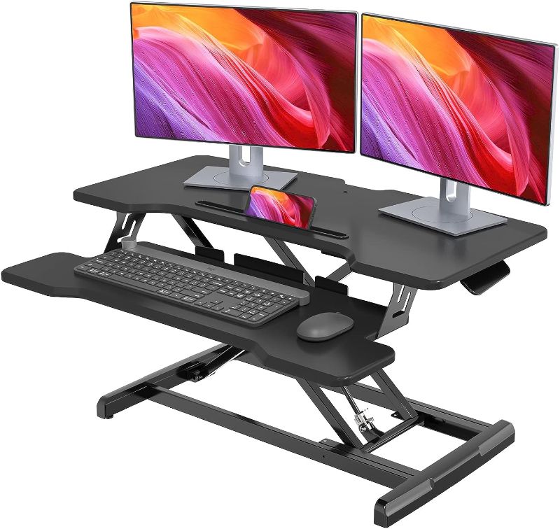 Photo 1 of JYLH JOYSEEKER Standing Desk Converter 32 inch, Height Adjustable Sit Stand Desk Riser, Quick Sit to Stand Tabletop Dual Monitor Riser Workstation for Home Office with Keyboard Tray, Black
