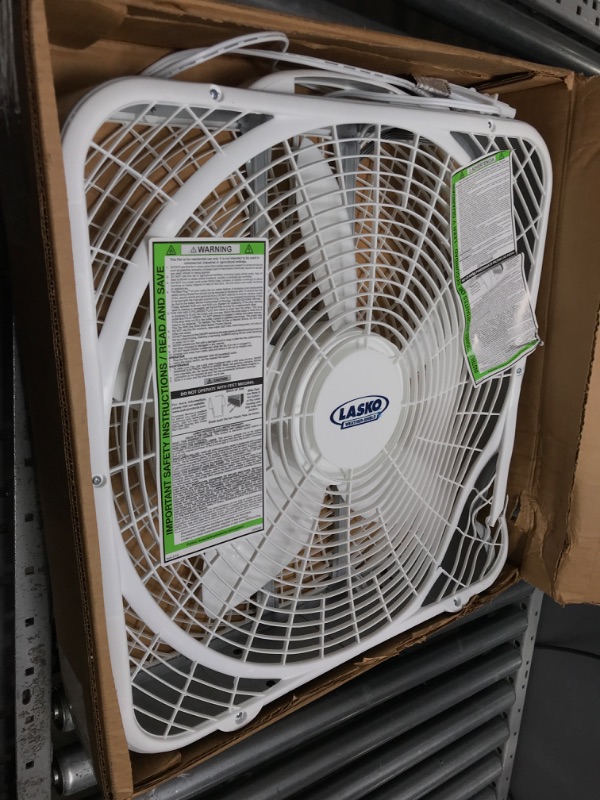 Photo 2 of **DAMAGED**
Lasko 20? Weather-Shield Performance Box Fan-Features Innovative Wind Ring System for Up to 30% More Air, 20 Inch, 3720