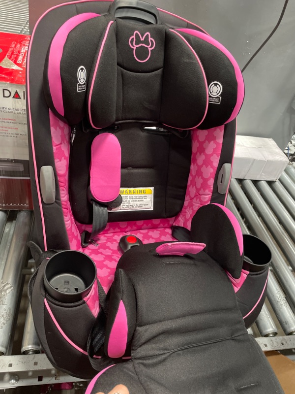 Photo 1 of **USED**
Disney Baby Grow and Go All-in-One Convertible Car Seat, Rear-facing 5-40 pounds, Forward-facing 22-65 pounds, and Belt-positioning booster 40-100 pounds, Simply Minnie