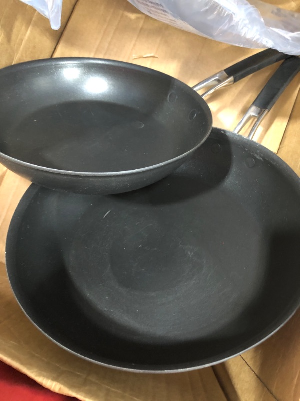 Photo 1 of A set of two pans 